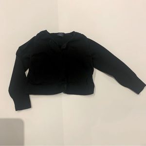 Baby Gap, girl’s black cardigan.